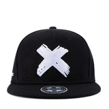 X Cap